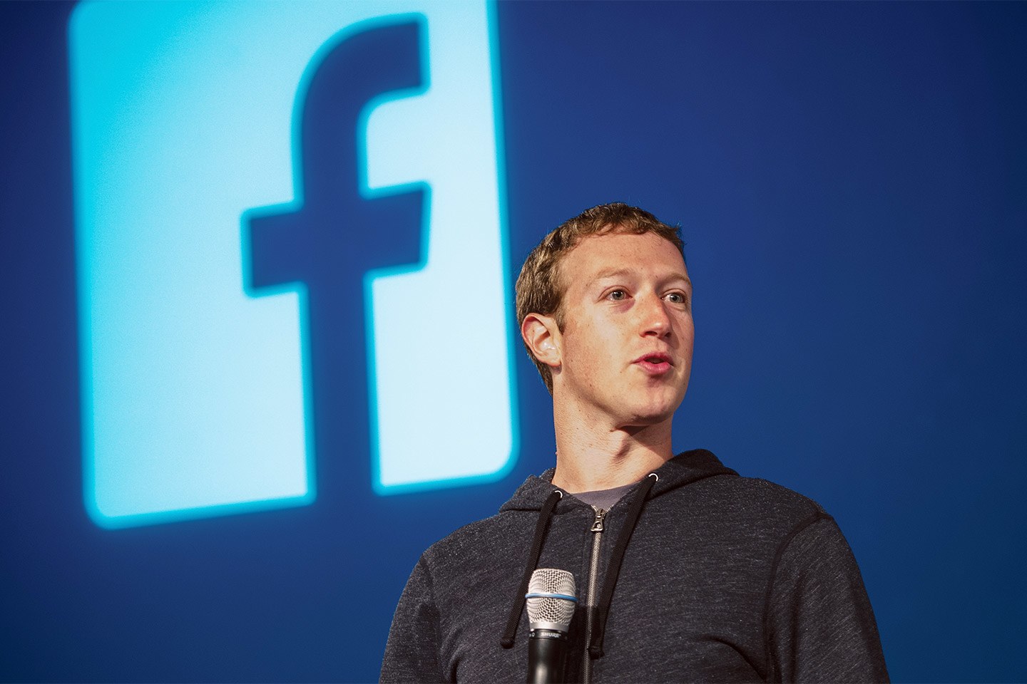 Mark Zuckerberg and the Facebook logo