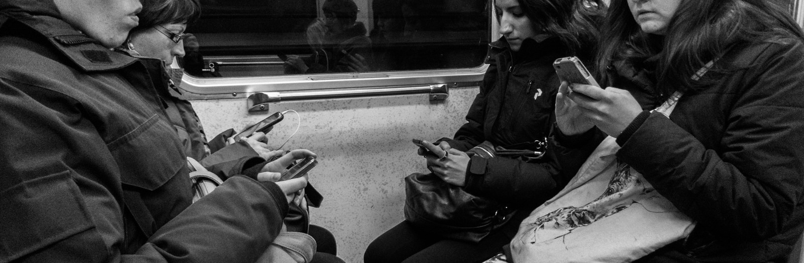 Staring at phones on the subway