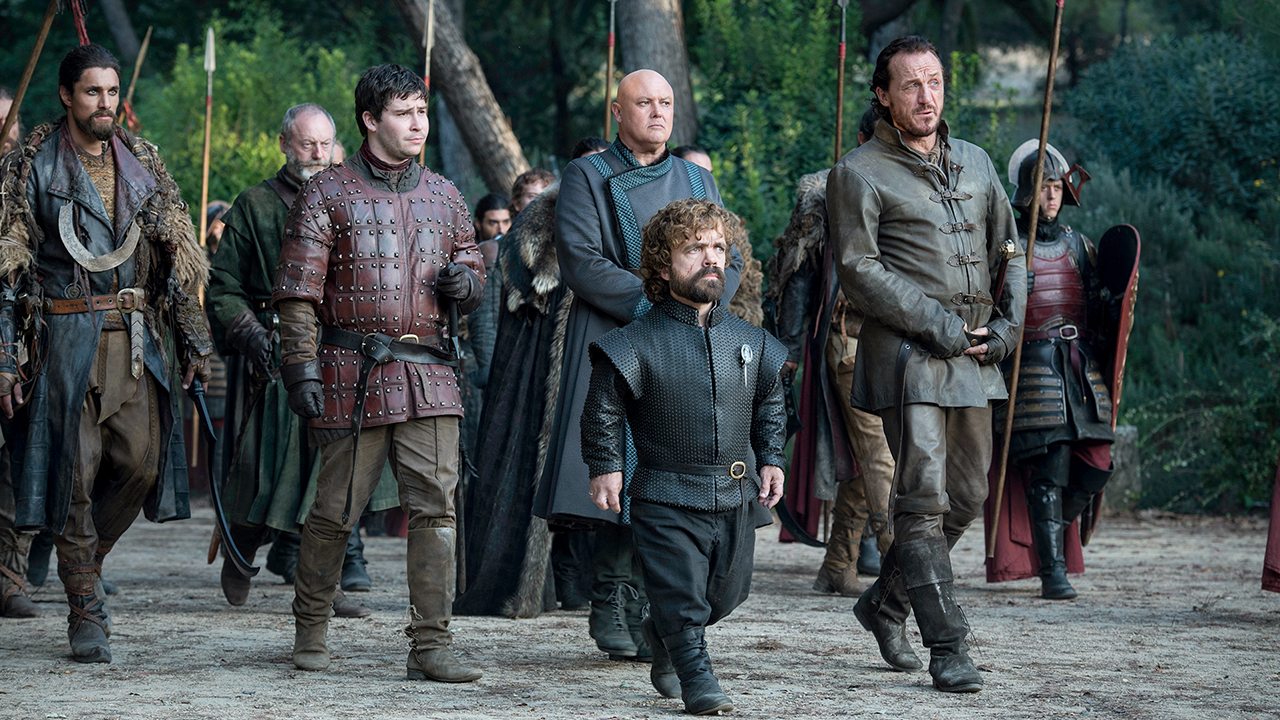 Podrick, Tyrion, and Bronn approach the Dragon Pit escorted by Lannister soldiers