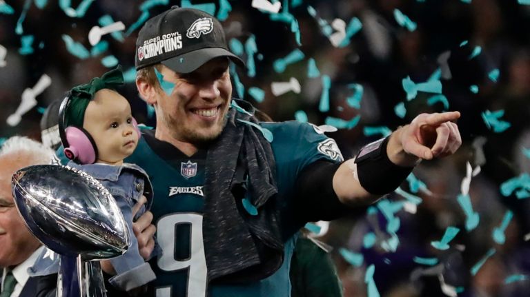 Nick Foles and his daughter celebrate the Philadelphia Eagles victory in Super Bowl 52