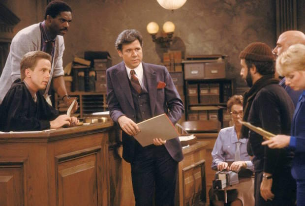 Harry Anderson, Charles Robinson, and John Larroquette as Harry Stone, Mac, and Dan Fielding on Night Court