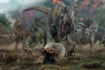 Franklin, Owen, and Claire are trapped in a dinosaur stampede in the poster for Jurassic World: Fallen Kingdom