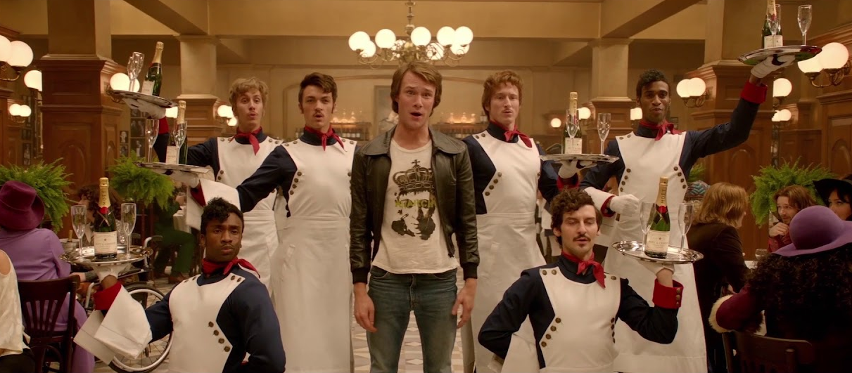 Hugh Skinner as young Harry in the "Waterloo" number from Mamma Mia 2