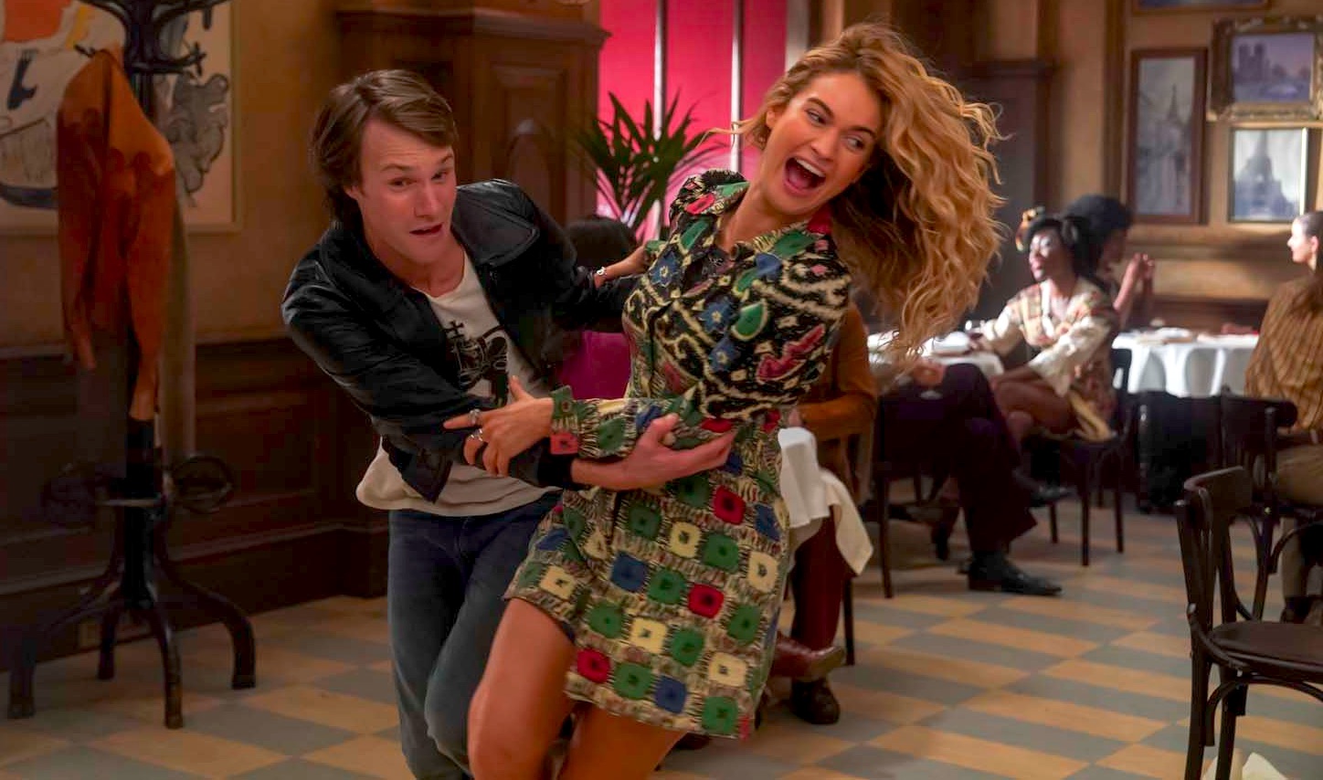 Hugh Skinner as young Harry and Lily James as young Donna in Mamma Mia! Here We Go Again
