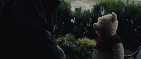 Christopher Robin (Ewan McGregor) and Winnie the Pooh meet again