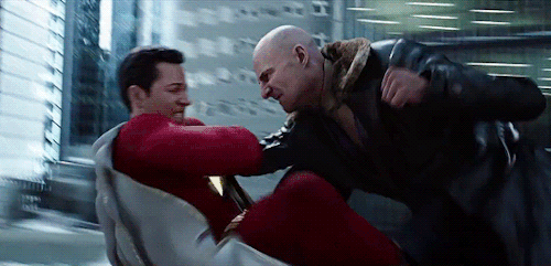 Dr. Sivana (Mark Strong) punches Billy Batson (Zachary Levi) in Shazam!