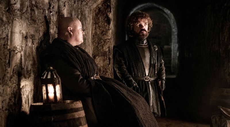 Lord Varys (Conleth Hill) and Tyrion Lannister (Peter Dinklage) in the crypts of Winterfell during "The Long Night" of HBO's Game of Thrones