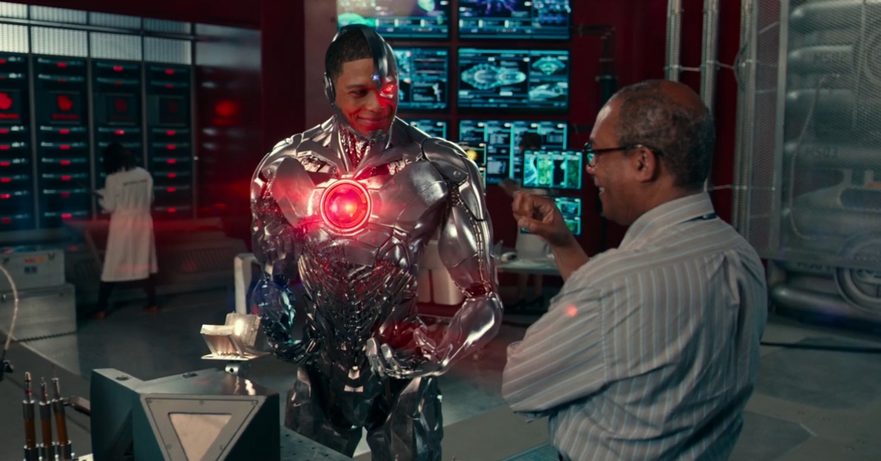 Cyborg (Ray Fisher) smiles at his father Silas Stone (Joe Morton) at the end of The Joss Whedon Cut of Justice League