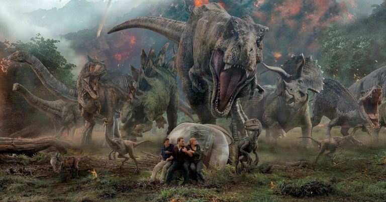 Franklin, Owen, and Claire are trapped in a dinosaur stampede in the poster for Jurassic World: Fallen Kingdom