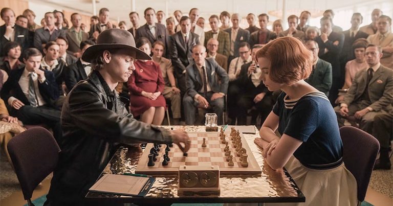Benny Watts (Thomas Brodie-Sangster) and Beth Harmon (Anya Taylor-Joy) play chess for the U.S. Open Championship in Las Vegas in episode 3 of The Queen's Gambit